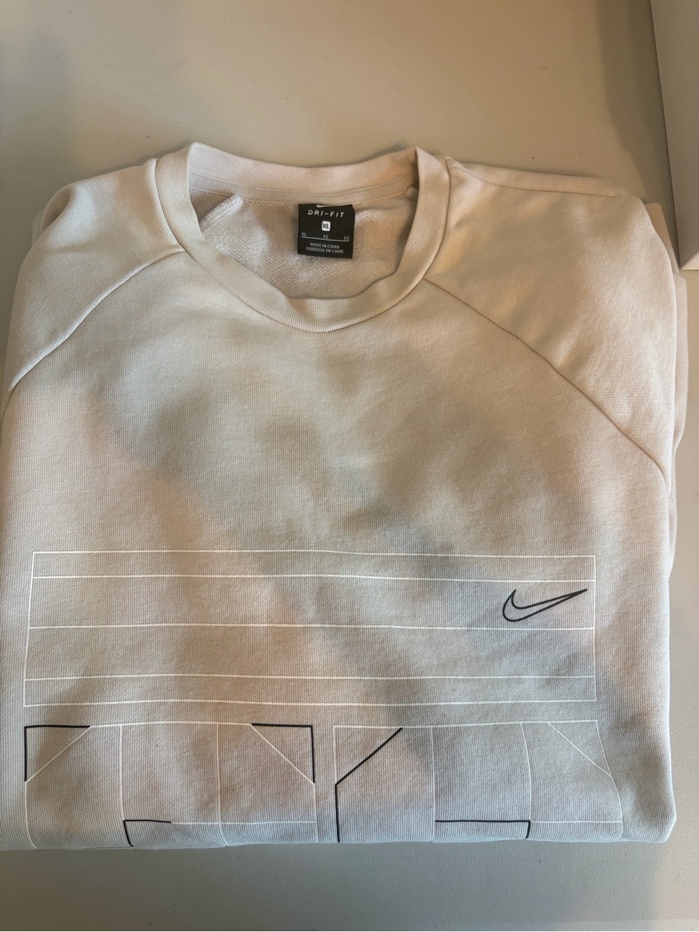Nike Men's Cream Crewneck Sweatshirt with Black Swoosh